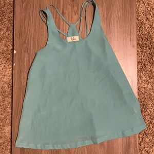 Teal strappy back tank.
